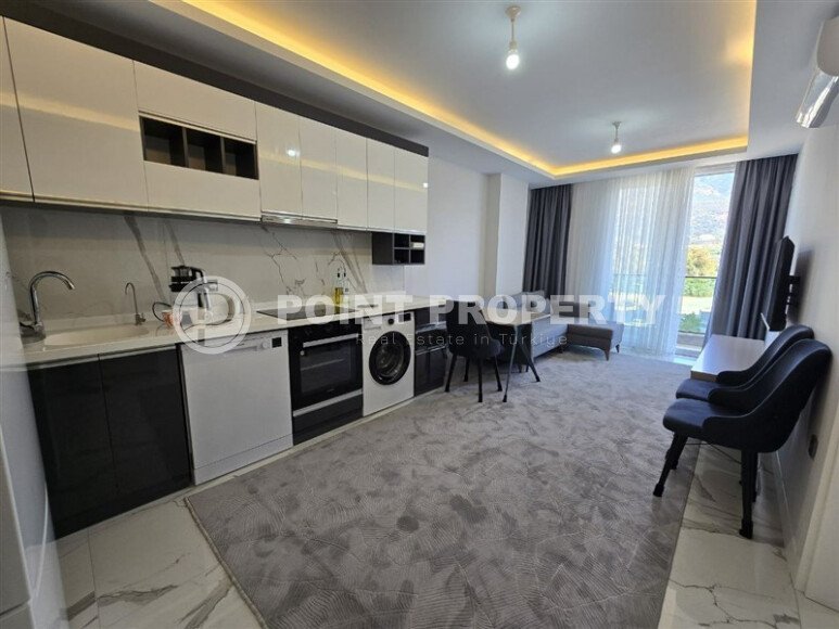 Современная квартира 1+1, 50 м², район Махмутлар, с крытой парковкой-id-10374-фото-3