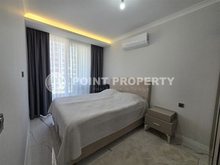 Современная квартира 1+1, 50 м², район Махмутлар, с крытой парковкой-id-10374-фото-6