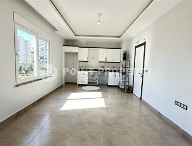 Светлая и уютная квартира 1+1, 56 м² в современном жилом комплексе с полной инфраструктурой в Махмутларе-id-10376-фото-2