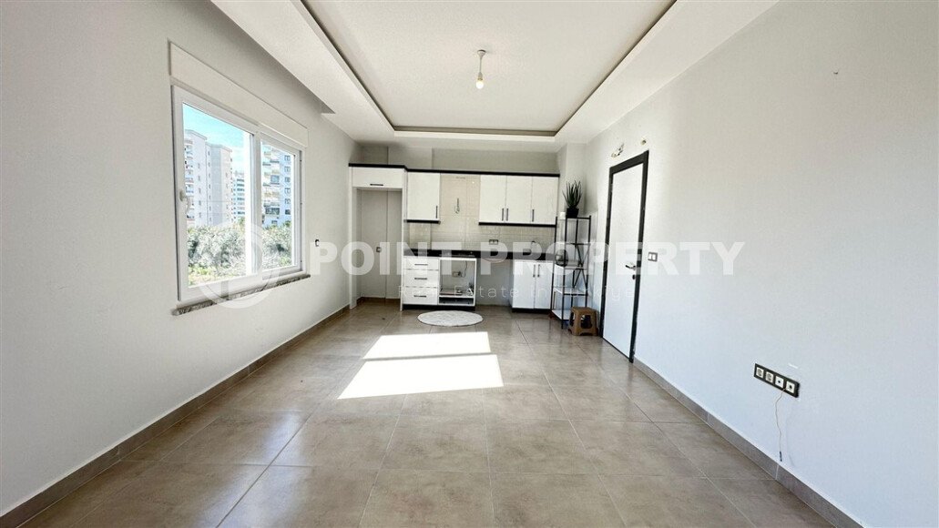 Светлая и уютная квартира 1+1, 56 м² в современном жилом комплексе с полной инфраструктурой в Махмутларе-id-10376-фото-2