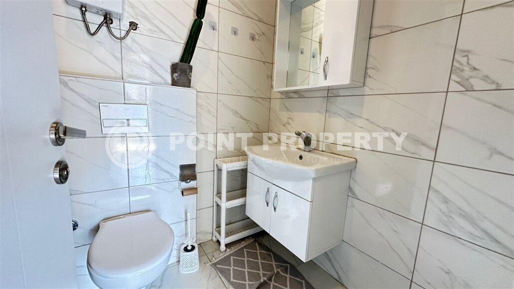 Светлая и уютная квартира 1+1, 56 м² в современном жилом комплексе с полной инфраструктурой в Махмутларе-id-10376-фото-4