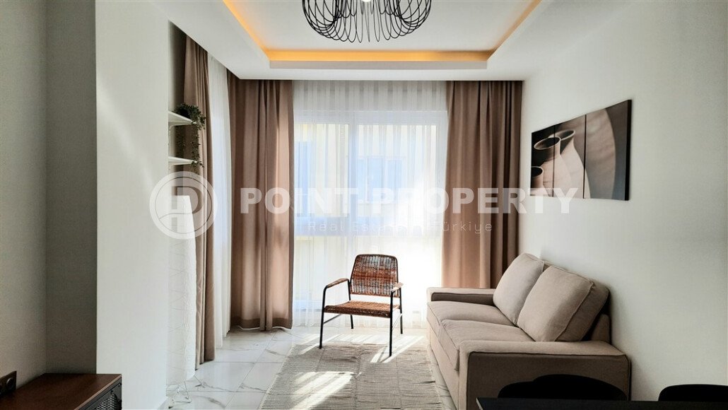 Просторная светлая квартира 2+1, 85 м² с полной мебелью и техникой в современном жилом комплексе в Махмутларе-id-10378-фото-2