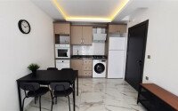 Просторная светлая квартира 2+1, 85 м² с полной мебелью и техникой в современном жилом комплексе в Махмутларе-id-10378-фото-12