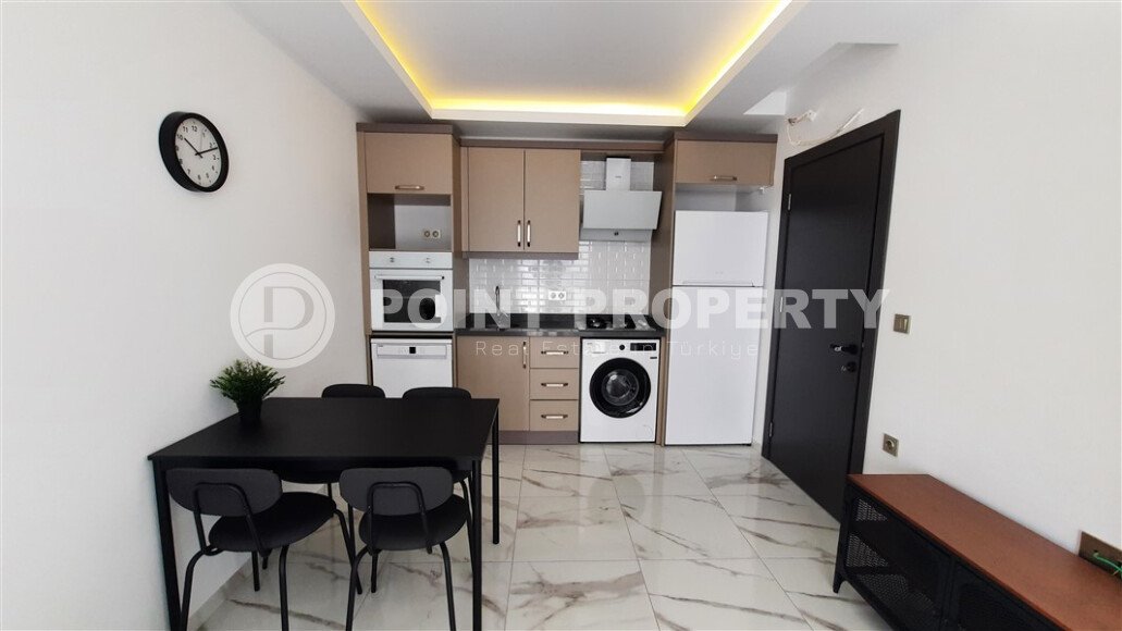 Просторная светлая квартира 2+1, 85 м² с полной мебелью и техникой в современном жилом комплексе в Махмутларе-id-10378-фото-12