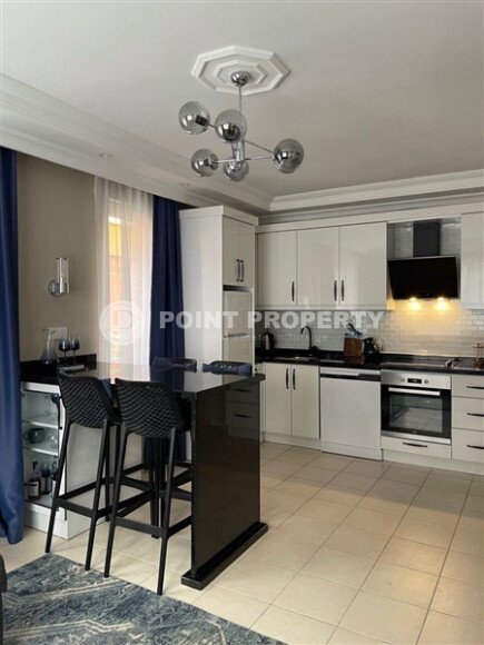 Просторная светлая двухспальная квартира 2+1, 110 м² с частичным видом на море в меблированном жилом комплексе в Обагёле-id-10380-фото-2