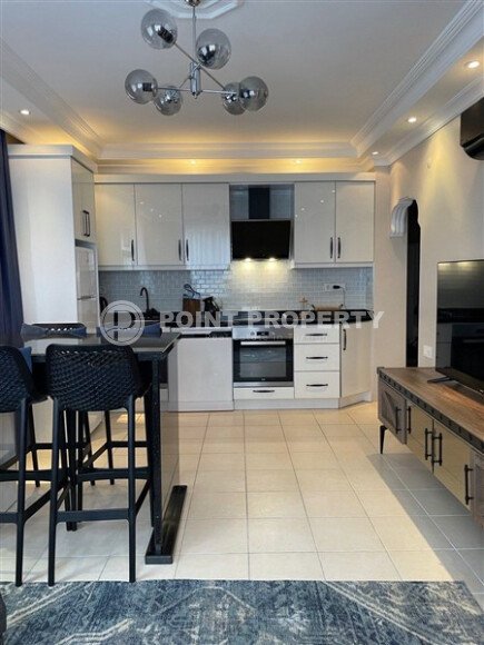 Просторная светлая двухспальная квартира 2+1, 110 м² с частичным видом на море в меблированном жилом комплексе в Обагёле-id-10380-фото-3