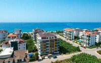 Квартира 2+1, 105 м² на первой линии моря в Кестеле с видом на море-id-10386-фото-37