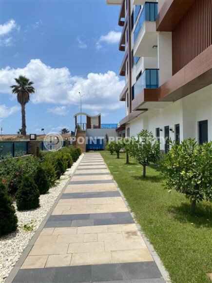 Квартира 2+1, 95 м² на первой линии моря в респектабельном районе Кестель-id-10396-фото-15