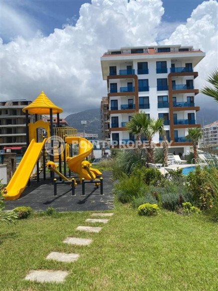 Квартира 2+1, 95 м² на первой линии моря в респектабельном районе Кестель-id-10396-фото-18