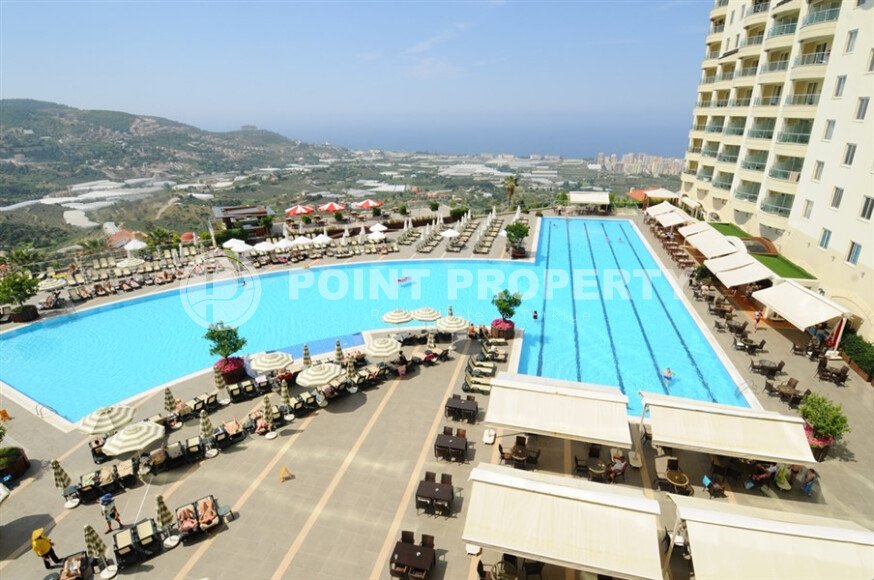 Spacious apartment – 140 m² in a hotel complex, Kargicak district, mountain view-id-10404-photo-1