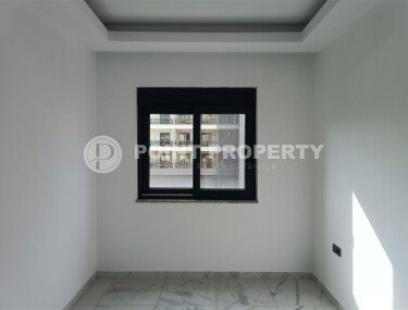 1+1 квартира 50 м² в новом комплексе Махмутлара с богатой инфраструктурой-id-10425-фото-3