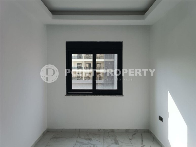 1+1 квартира 50 м² в новом комплексе Махмутлара с богатой инфраструктурой-id-10425-фото-3