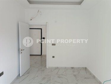 1+1 квартира 50 м² в новом комплексе Махмутлара с богатой инфраструктурой-id-10425-фото-4