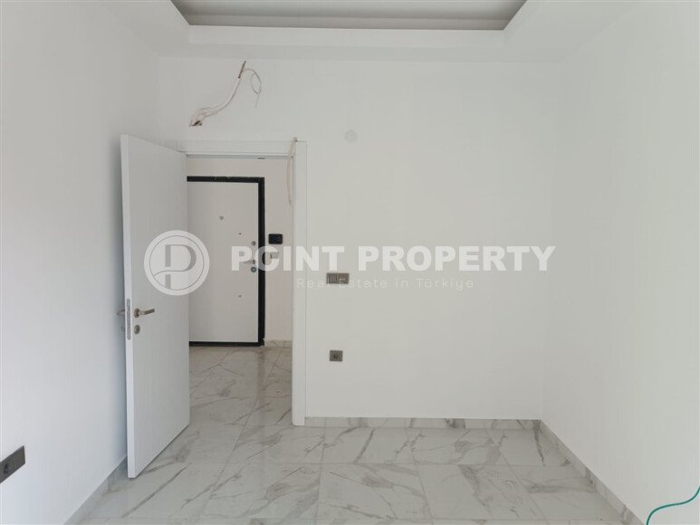 1+1 квартира 50 м² в новом комплексе Махмутлара с богатой инфраструктурой-id-10425-фото-4