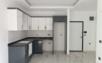 1+1 квартира 50 м² в новом комплексе Махмутлара с богатой инфраструктурой-id-10425-фото-5