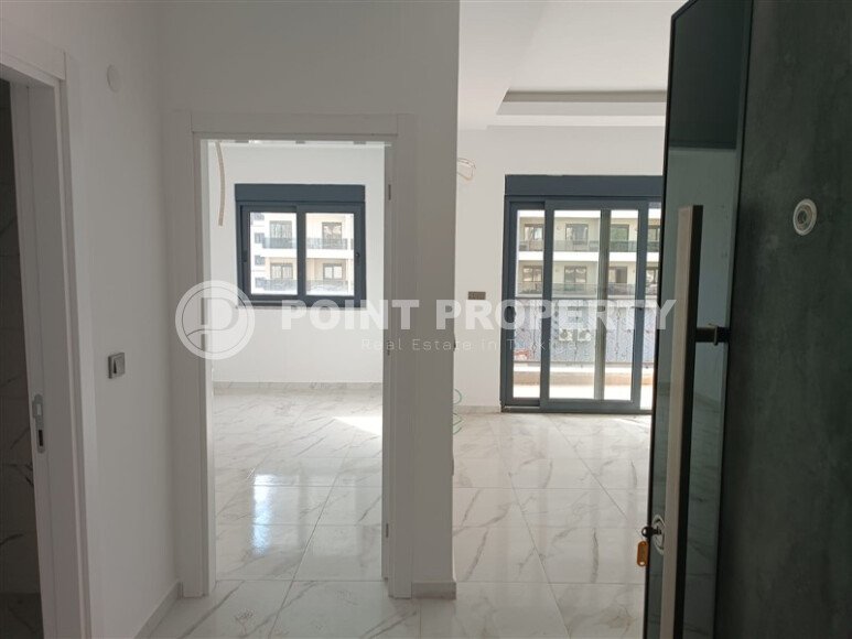 1+1 квартира 50 м² в новом комплексе Махмутлара с богатой инфраструктурой-id-10425-фото-6