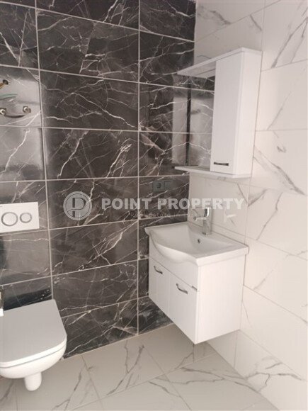 1+1 квартира 50 м² в новом комплексе Махмутлара с богатой инфраструктурой-id-10425-фото-8