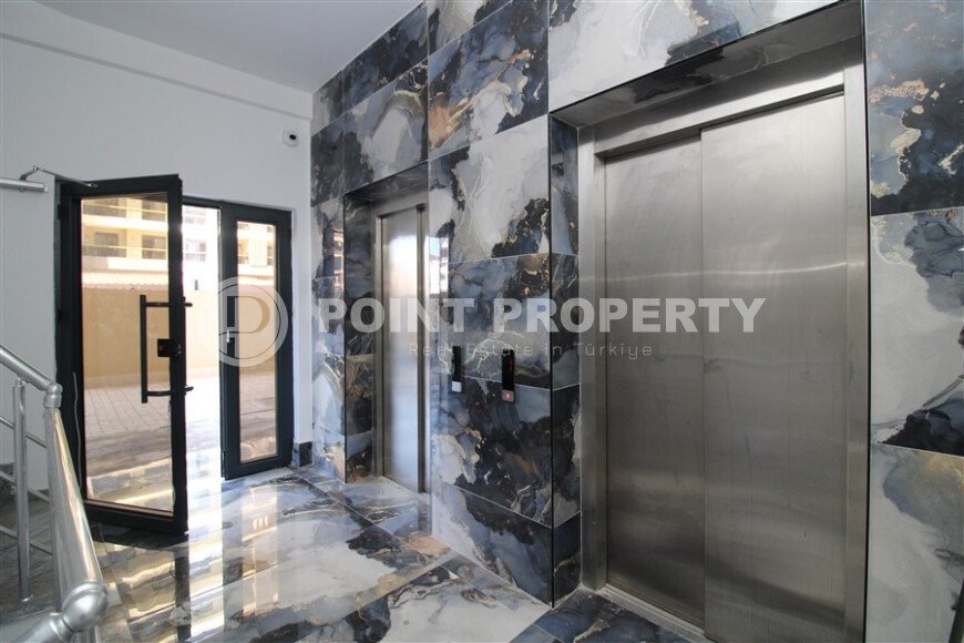 1+1 квартира 50 м² в новом комплексе Махмутлара с богатой инфраструктурой-id-10425-фото-10