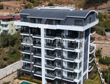 Доступные по цене квартиры с рассрочкой платежа в жилом комплексе на этапе строительства, в зеленом, экологически чистом районе Аланьи - Демирташ-id-7301-фото-1