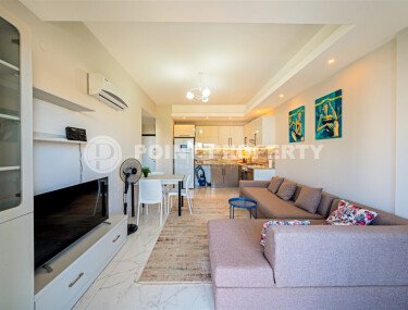 Comfortable 1+1 apartment – 50 m², Avsallar district, modern complex with a wide range of amenities-id-10434-photo-1