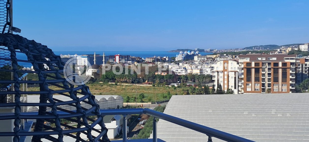 Современный дуплекс 2+1 – 110 м², район Авсаллар, частичный вид на море-id-10436-фото-7