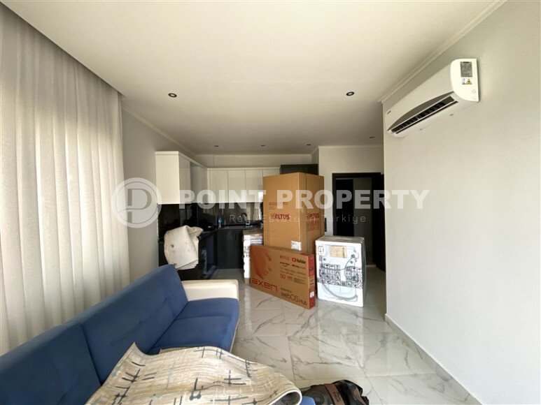 Светлая 45 m² квартира в районе Оба в современном комплексе-id-10440-фото-3