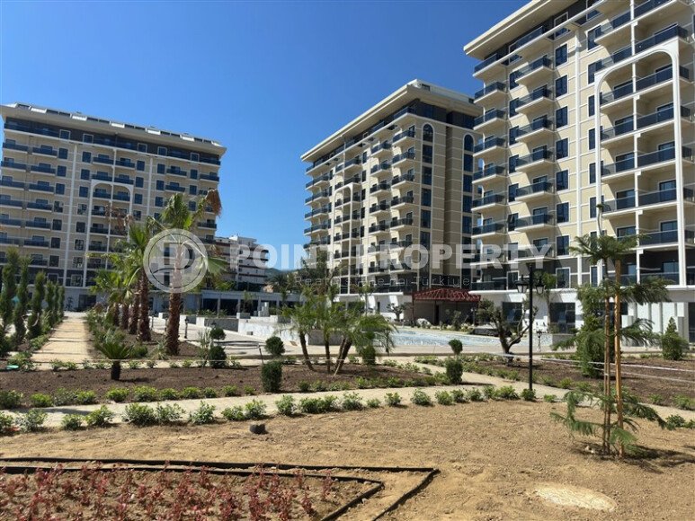 Квартира 1+1 в Демирташе 52 m² в комплексе отельного типа-id-10445-фото-1