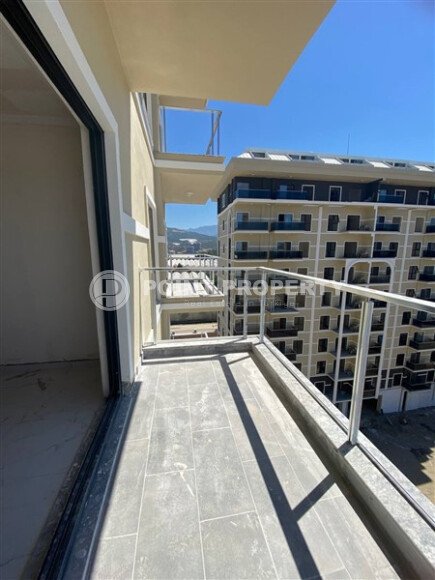 Квартира 1+1 в Демирташе 52 m² в комплексе отельного типа-id-10445-фото-5