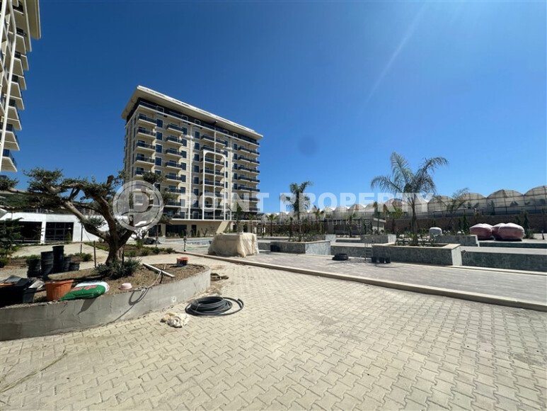 Квартира 1+1 в Демирташе 52 m² в комплексе отельного типа-id-10445-фото-6