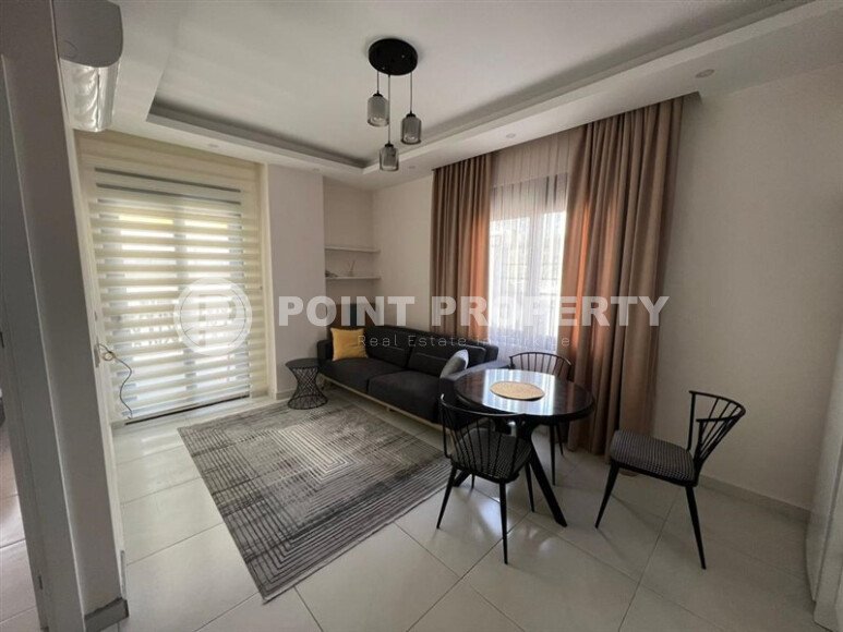 1+1 apartment in Mahmutlar, 55 m², in a complex with infrastructure-id-10447-photo-2