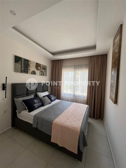 1+1 apartment in Mahmutlar, 55 m², in a complex with infrastructure-id-10447-photo-4