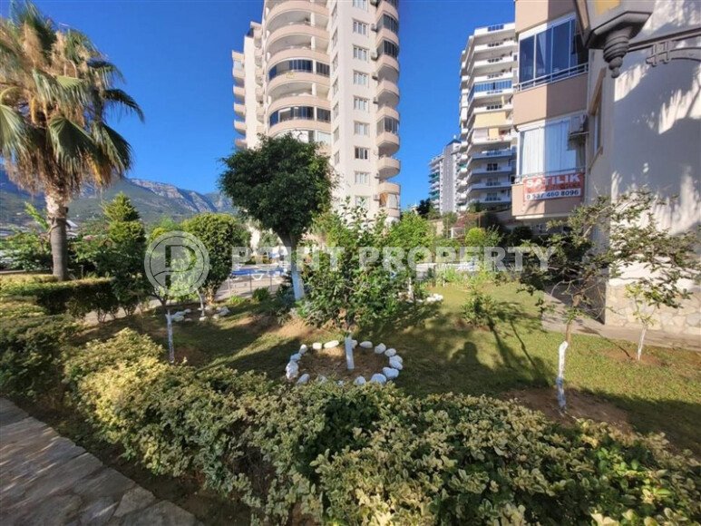 Large 2+1 apartment – 115 m2 with beautiful mountain views in Mahmutlar-id-10449-photo-1