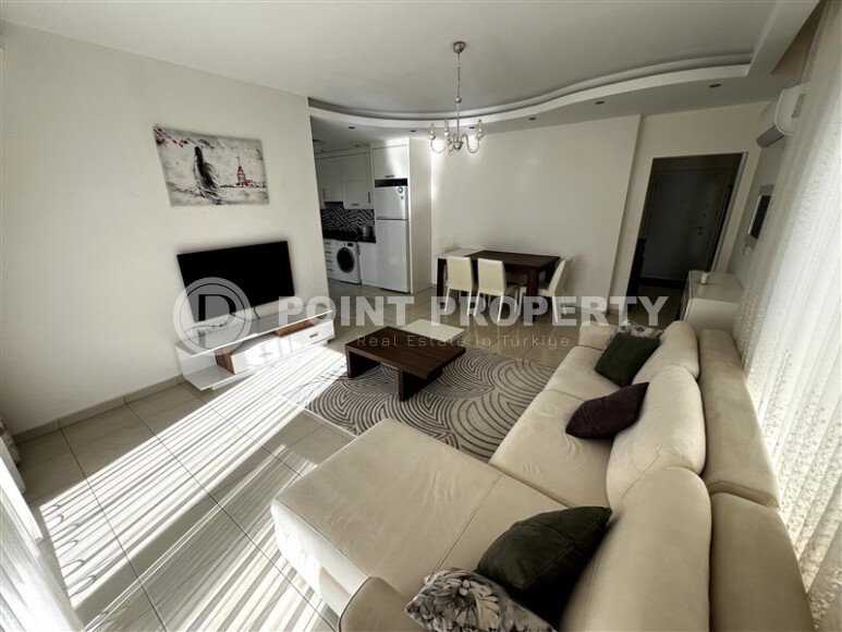 Spacious 2+1 apartment – 100 m2 with a beautiful view of the pool and surrounding area in Mahmutlar-id-10450-photo-2