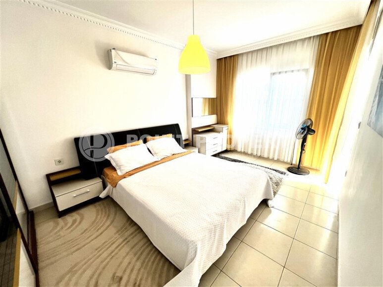 Spacious 2+1 apartment – 100 m2 with a beautiful view of the pool and surrounding area in Mahmutlar-id-10450-photo-4