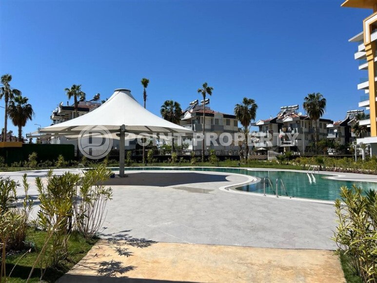 Современная квартира 129 м² в Тюрклере с панорамными окнами и инфраструктурой отеля-id-10458-фото-18