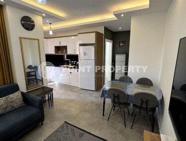 Комфортная 52 m² квартира в Махмутлар с застеклённым балконом-id-10460-фото-4
