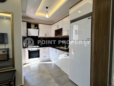 Комфортная 52 m² квартира в Махмутлар с застеклённым балконом-id-10460-фото-3