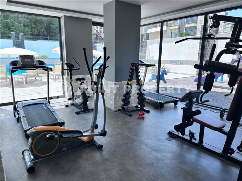 Комфортная 52 m² квартира в Махмутлар с застеклённым балконом-id-10460-фото-11