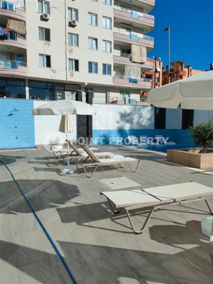 Комфортная 52 m² квартира в Махмутлар с застеклённым балконом-id-10460-фото-14