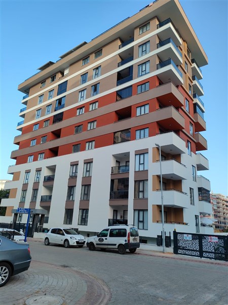 Элегантная квартира 52 м² в Махмутларе с застеклённым балконом и современным дизайном-id-10463-фото-1