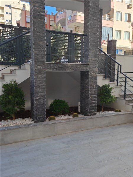 Элегантная квартира 52 м² в Махмутларе с застеклённым балконом и современным дизайном-id-10463-фото-6