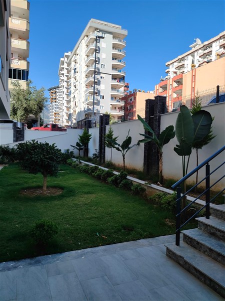 Элегантная квартира 52 м² в Махмутларе с застеклённым балконом и современным дизайном-id-10463-фото-7