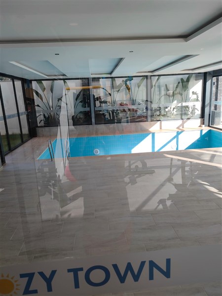 Элегантная квартира 52 м² в Махмутларе с застеклённым балконом и современным дизайном-id-10463-фото-17