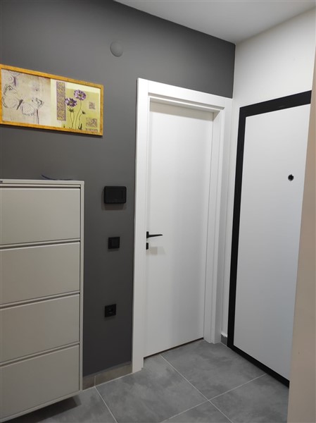 Элегантная квартира 52 м² в Махмутларе с застеклённым балконом и современным дизайном-id-10463-фото-23