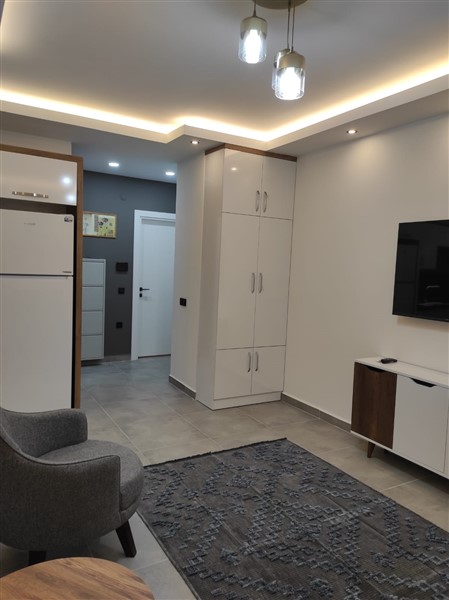 Элегантная квартира 52 м² в Махмутларе с застеклённым балконом и современным дизайном-id-10463-фото-24