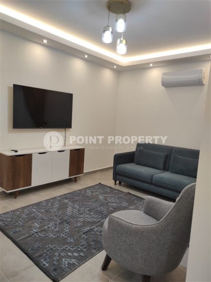 Элегантная квартира 52 м² в Махмутларе с застеклённым балконом и современным дизайном-id-10463-фото-26