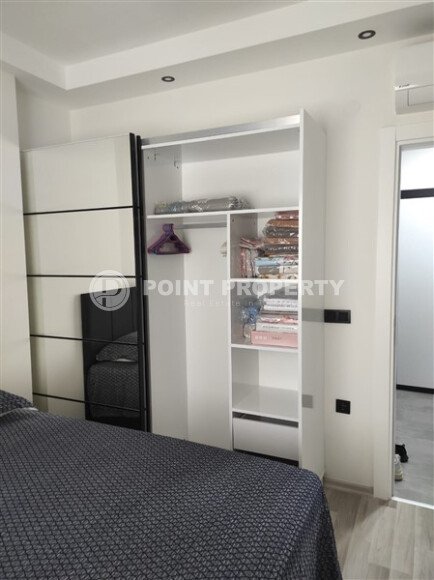 Элегантная квартира 52 м² в Махмутларе с застеклённым балконом и современным дизайном-id-10463-фото-28