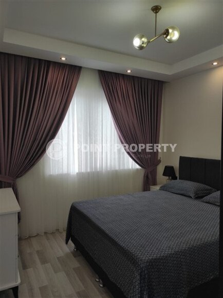 Элегантная квартира 52 м² в Махмутларе с застеклённым балконом и современным дизайном-id-10463-фото-30