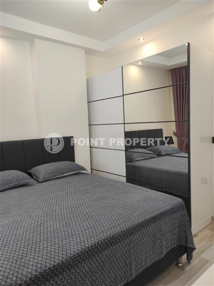 Элегантная квартира 52 м² в Махмутларе с застеклённым балконом и современным дизайном-id-10463-фото-31