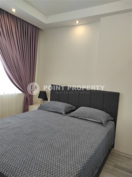 Элегантная квартира 52 м² в Махмутларе с застеклённым балконом и современным дизайном-id-10463-фото-33